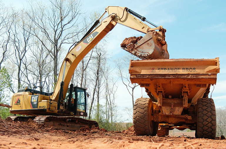 Strange Bros. Grading Company-Owned Machinery